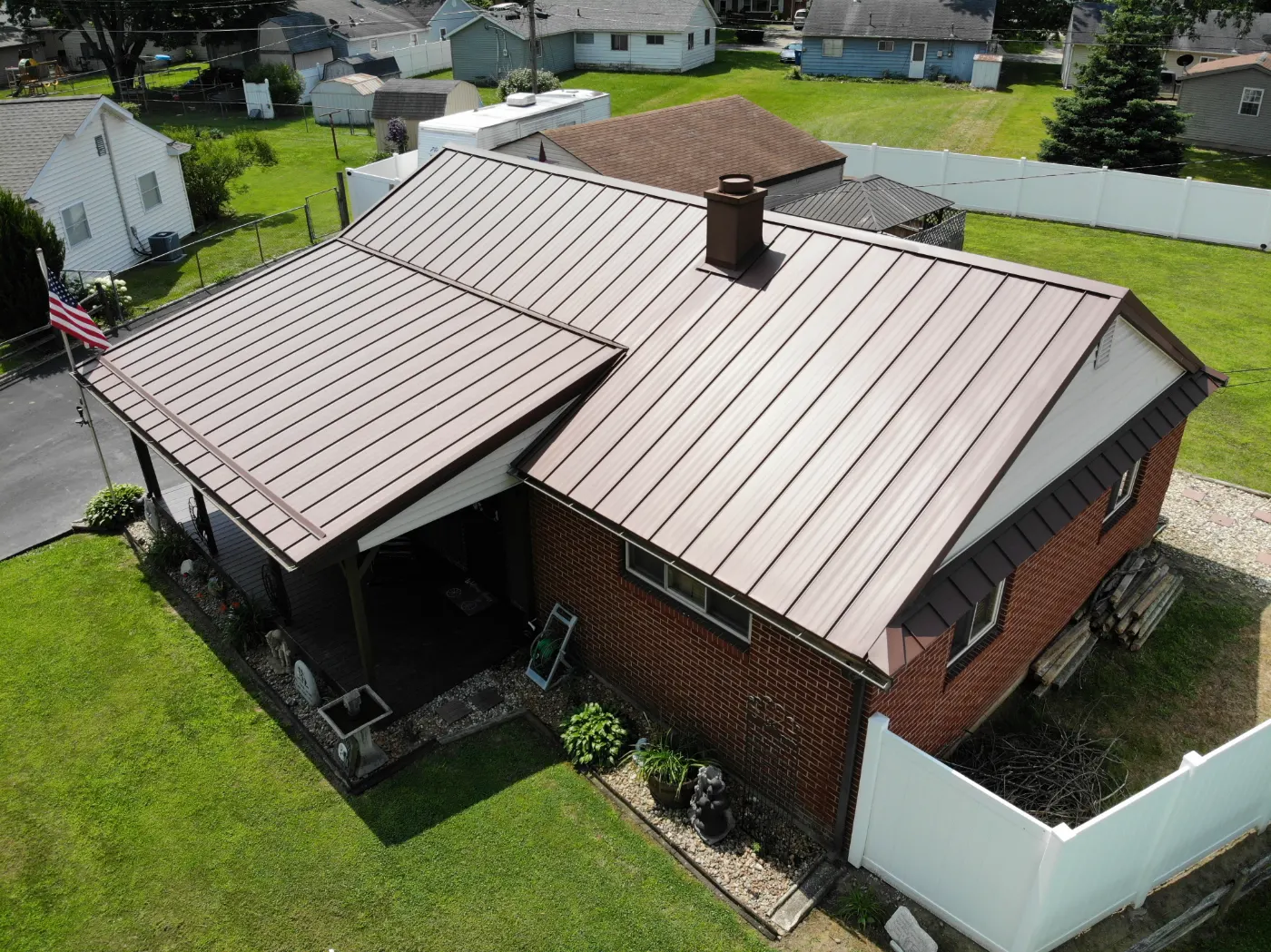 Tarping and dry-in on a Clay City commercial roof